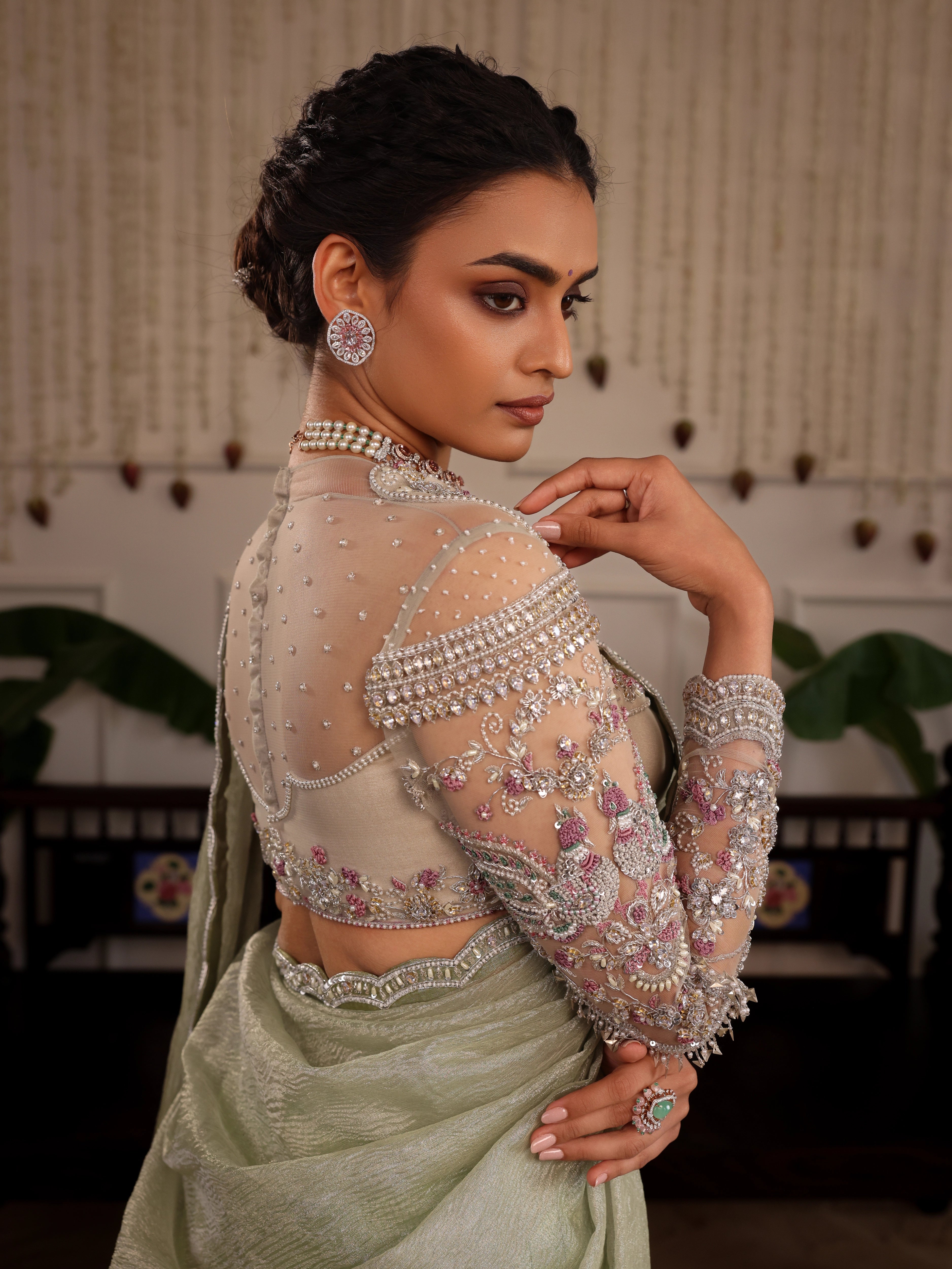 Model Sanskriti Mishra in pastel green kanjeevaram silk half saree blouse and vummidi bangaru diamond jewellery