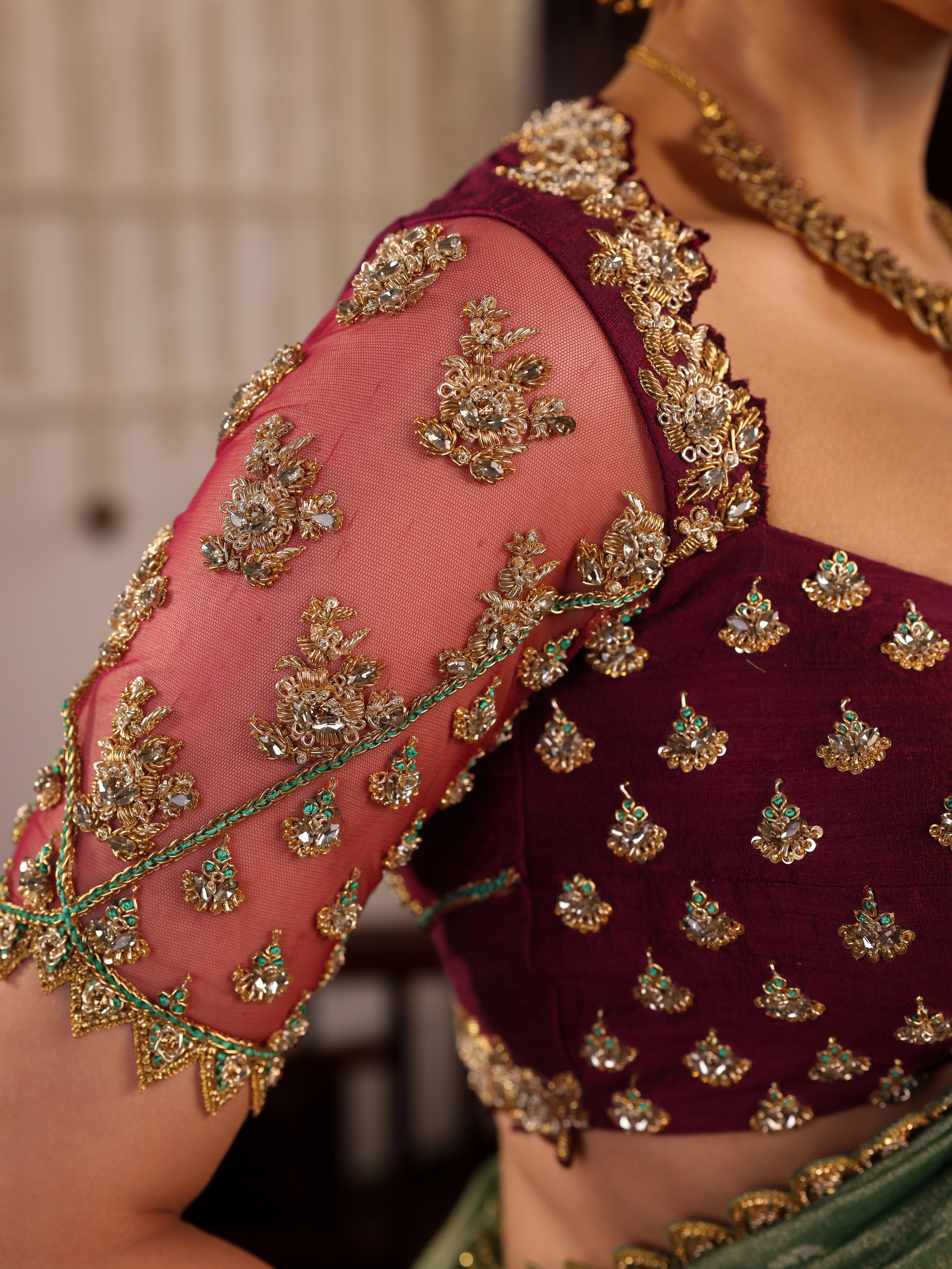 Model Sanskriti Mishra in sea green & wine red jacquard silk half saree blouse sleeve with vummidi bangaru jewellery