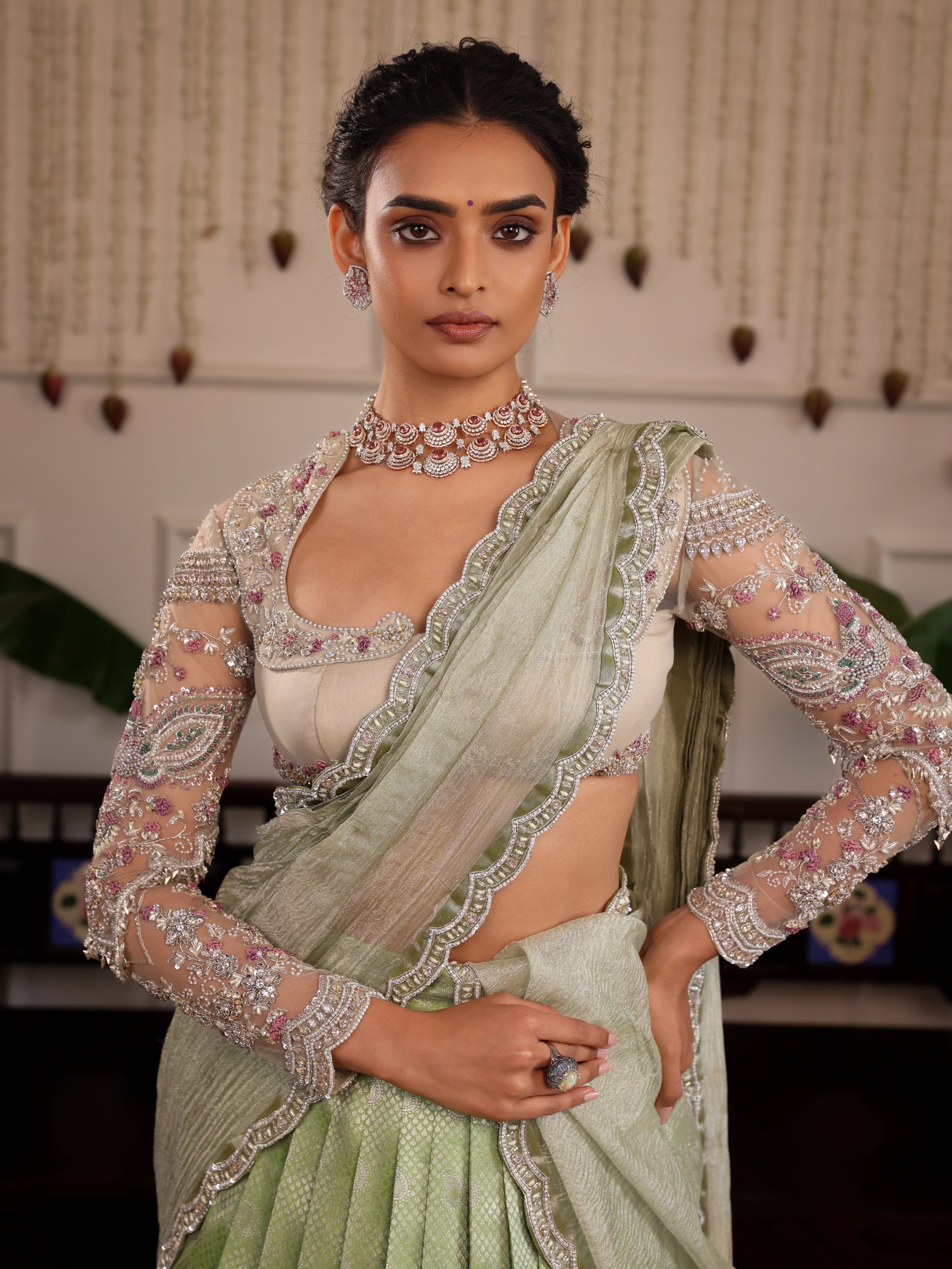 Model Sanskriti Mishra poses in pastel green kanjeevaram silk half saree with vummidi bangaru diamond jewellery
