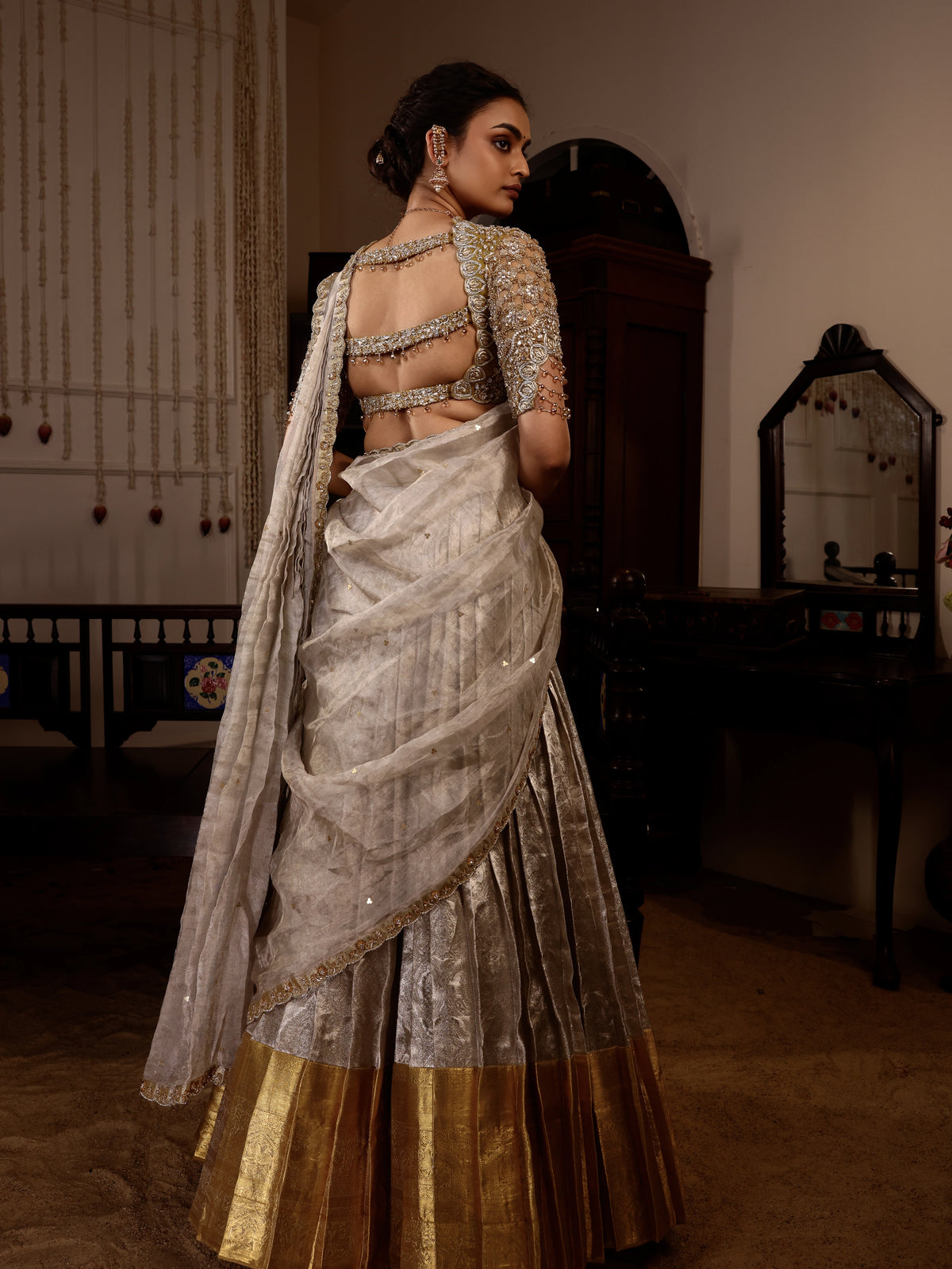 Model Sanskriti Mishra in gold and silver kanjeevaram silk half saree with vummidi bangaru jewllery model-sanskriti-mishra-silver-gold-silk-half-saree-vummidi-bangaru-jewllery