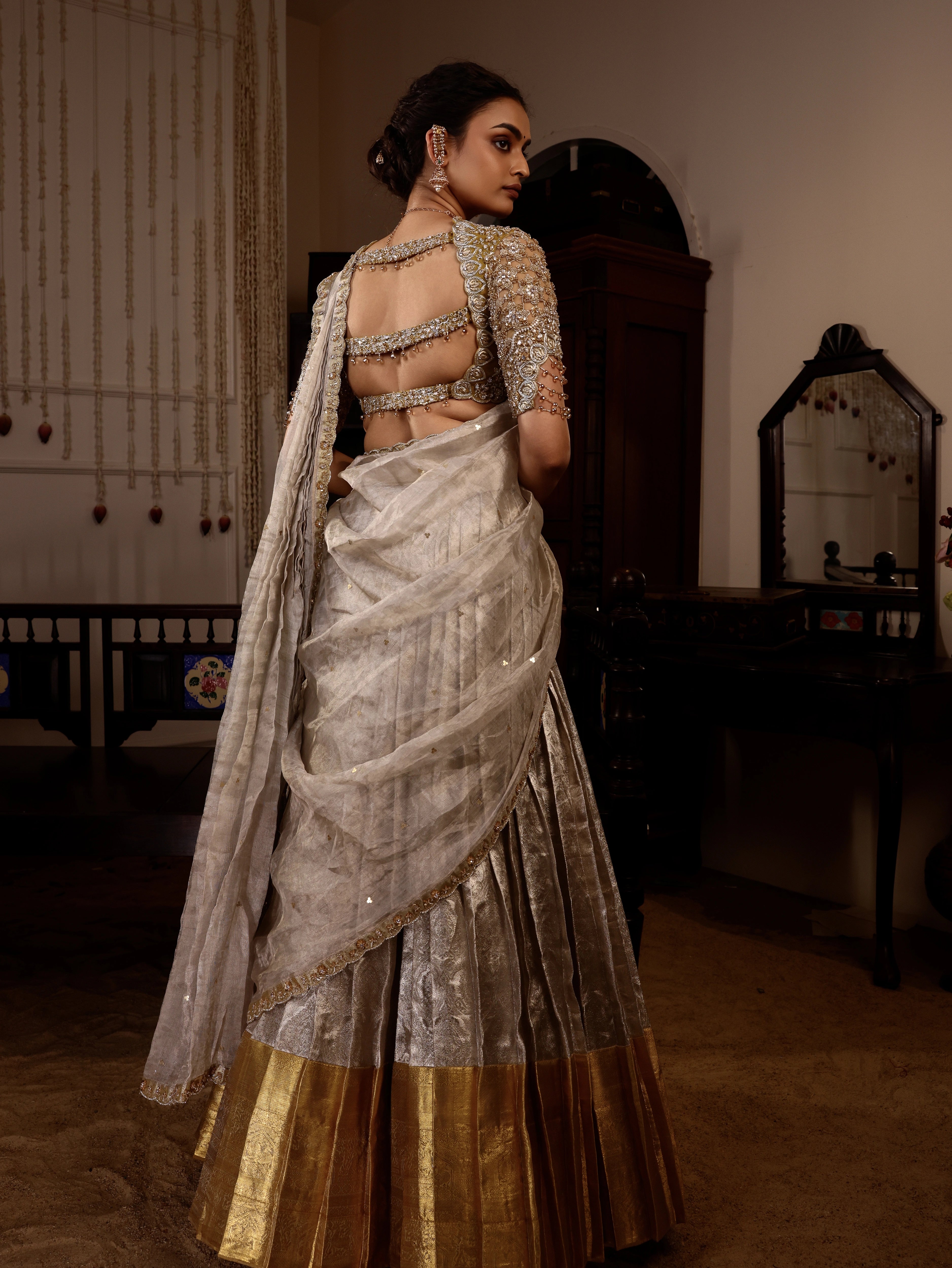 Model Sanskriti Mishra in gold and silver kanjeevaram silk half saree with vummidi bangaru jewllery