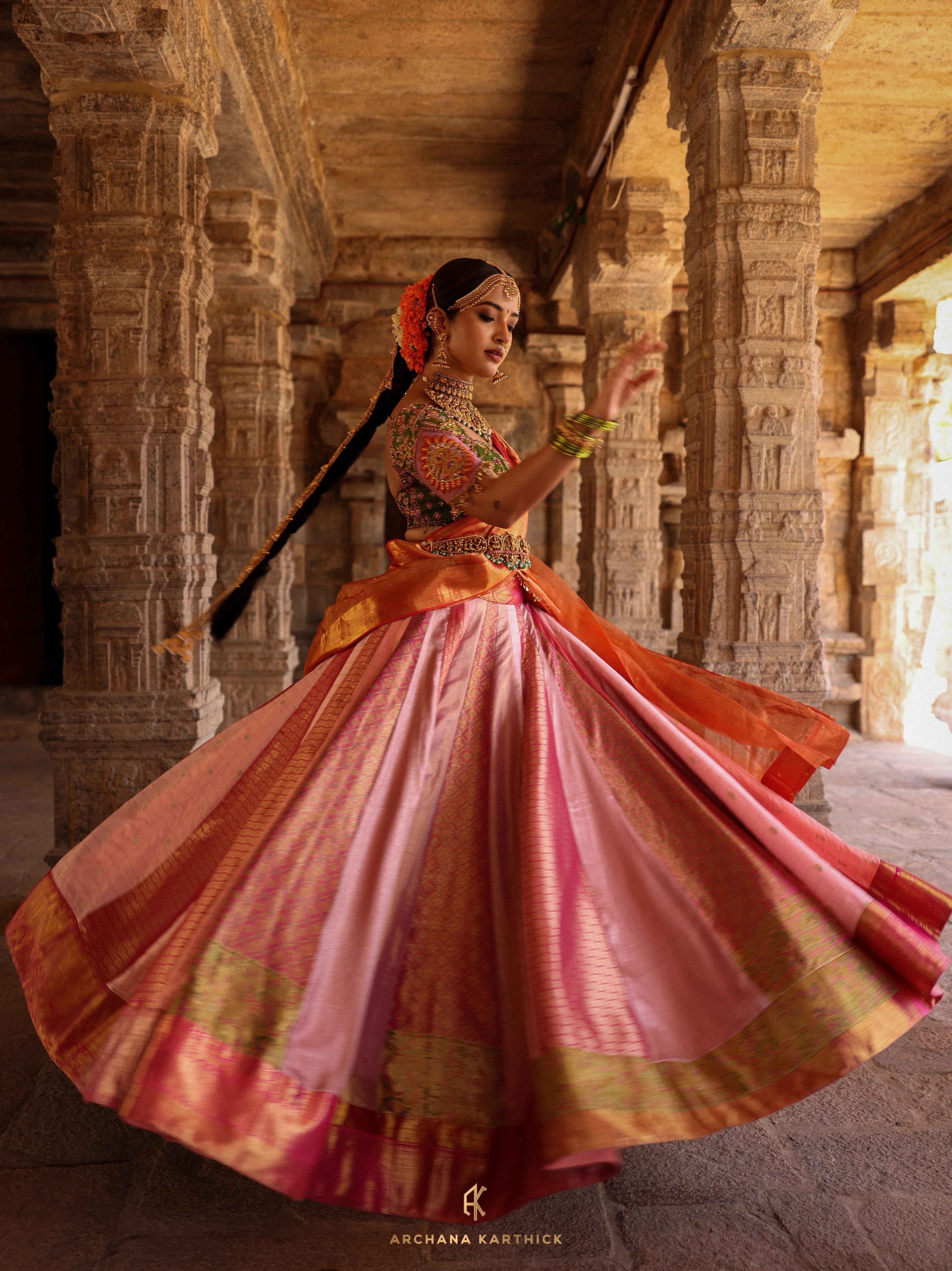 "Kundhavai" - Pink, Orange & Green Kanjeevaram Tissue Silk Half Saree