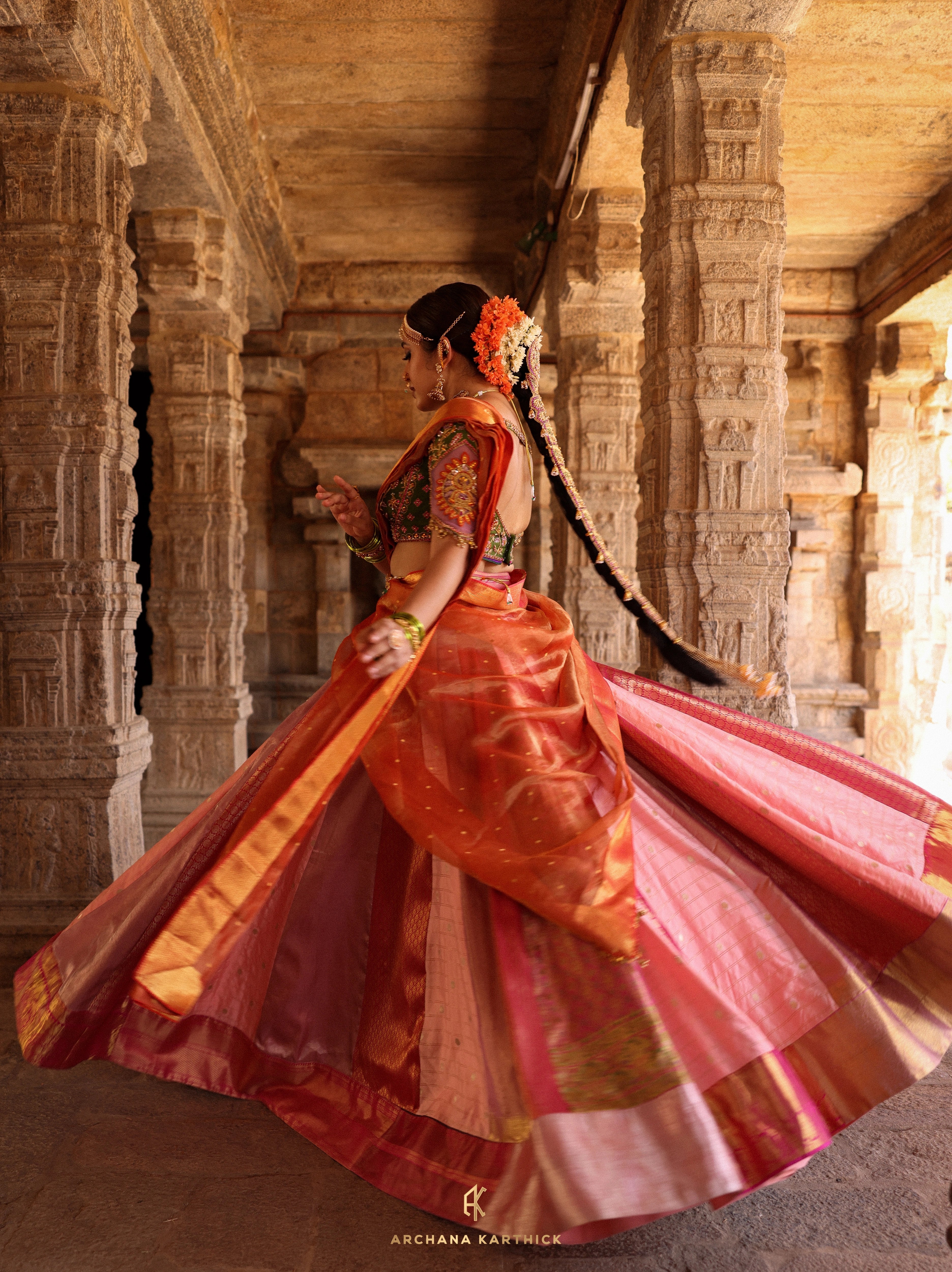 "Kundhavai" - Pink, Orange & Green Kanjeevaram Tissue Silk Half Saree