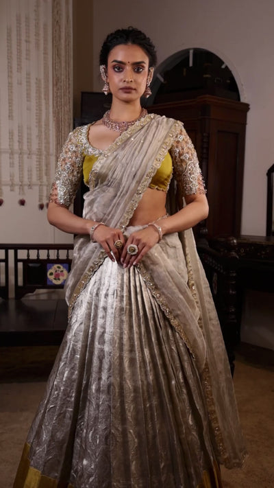 Model Sanskriti Mishra in a gold and silver kanjeevaram silk half saree music video with vummidi bangaru jewllery