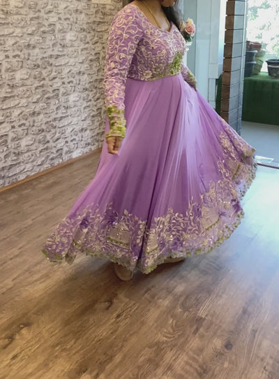 Archana Ajay Kumar twirling in a lavender anarkali, intricately handcrafted with cutdana, sequins and zardozi by team Archana Karthick.