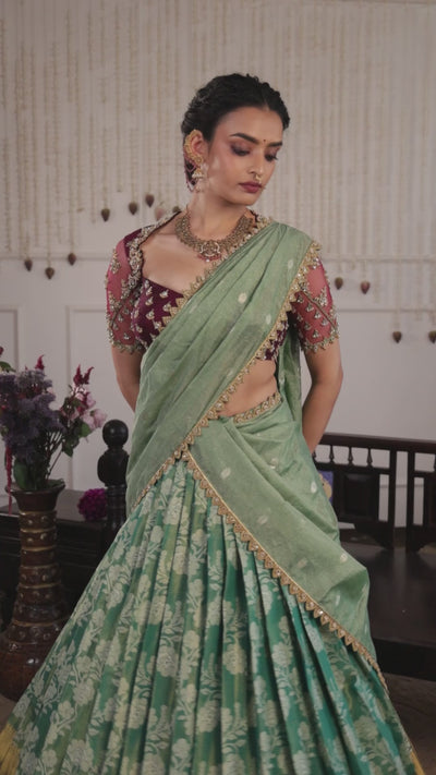 Model Sanskriti Mishra in sea green & wine red jacquard silk half saree music video with vummidi bangaru gold jewellery