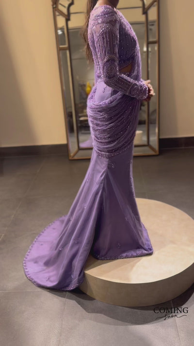 Video of bridal fittings session design in a lavender tulle draped saree, handcrafted with rhinestones, zardozi, sequins, crystals, cutdana and resham by team Archana Karthick.