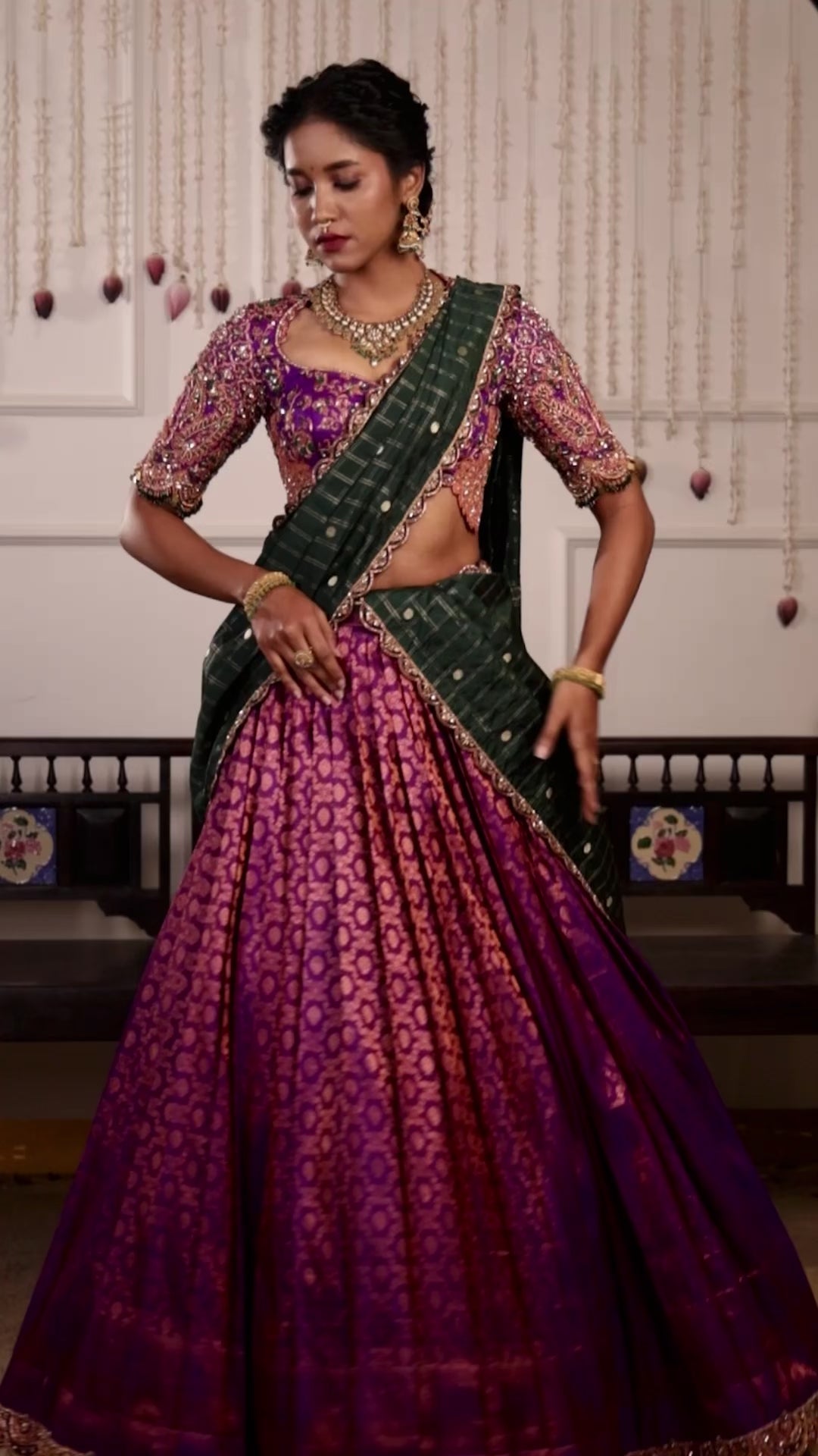 Model Gayathri Dhanasekar in purple and green kanjeevaram silk half saree music video with vummidi bangaru jewellery