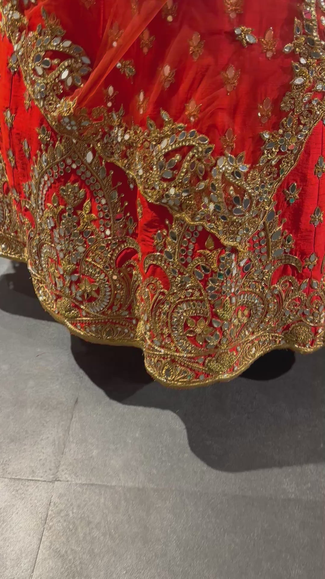 Bride Vaishali from Dubai, during her fittings in an orange lehenga designed by Archana Karthick.