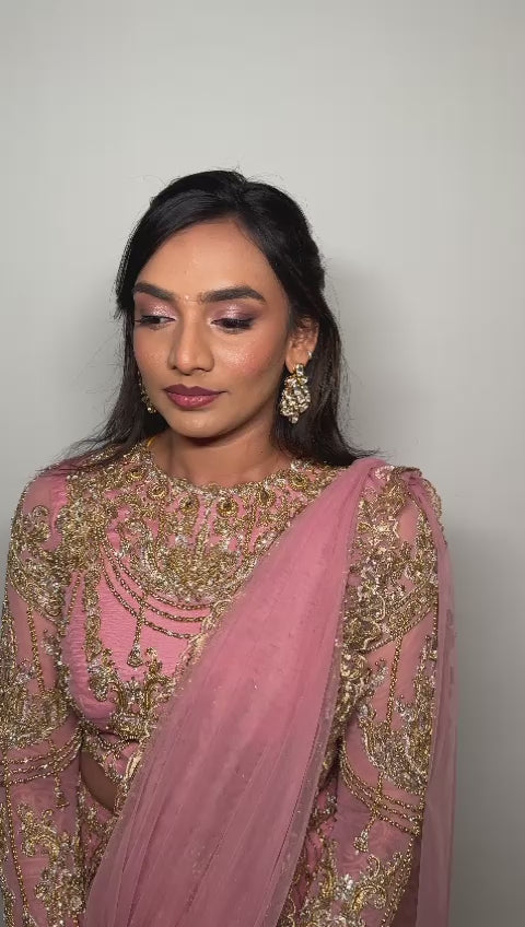Bride Sushimita from US in a video in an onion pink tulle lehenga by team Archana Karthick.